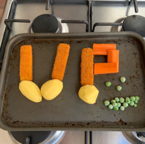 Carrots and potatoes in the shape of UP